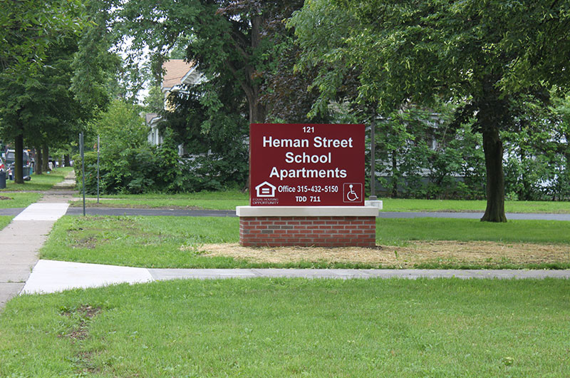 property management company client list syracuse ny front view image of welcome sign for herman street school apartments