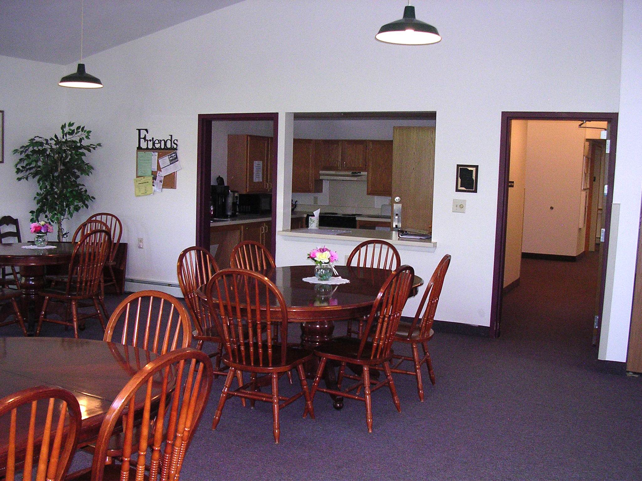 property management company syracuse ny image of community room and kitchen at colonial village