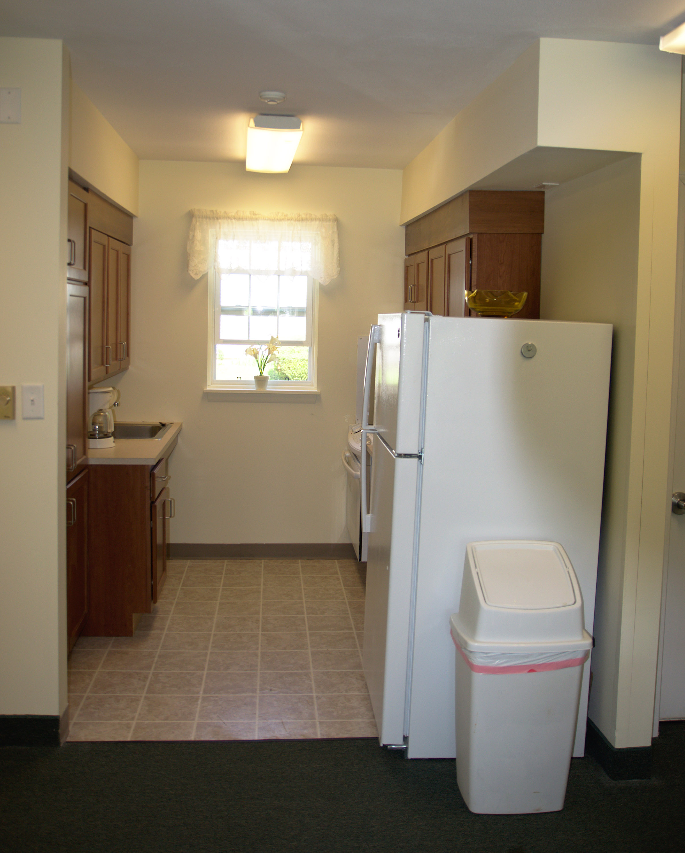 property management company syracuse ny image of community room kitchen at community manor II