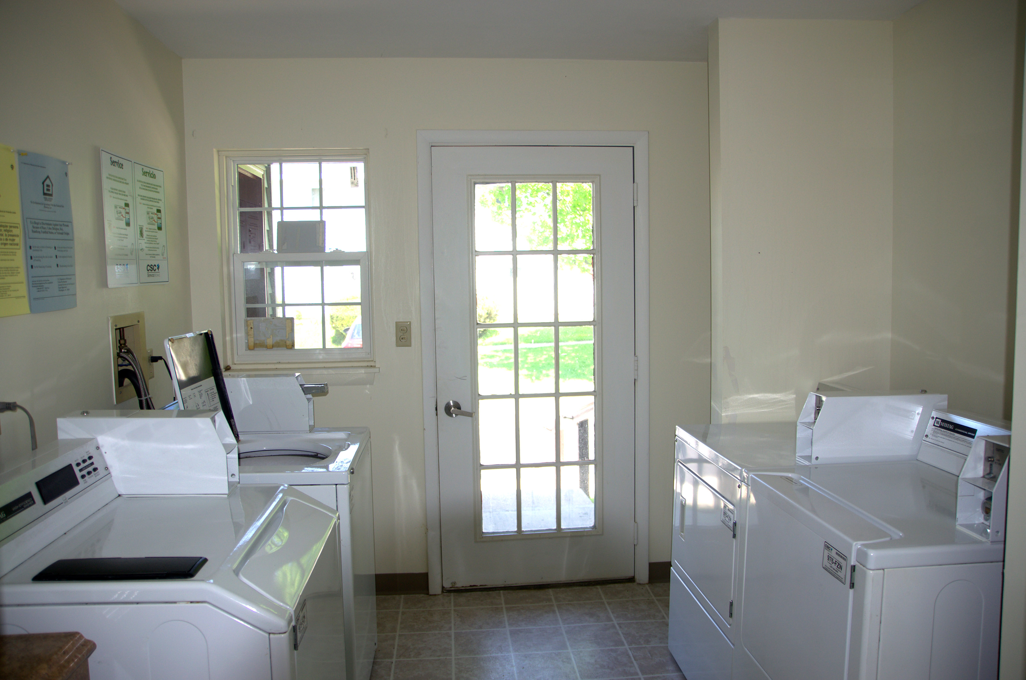 property management company syracuse ny image of community laundry room at community manor II
