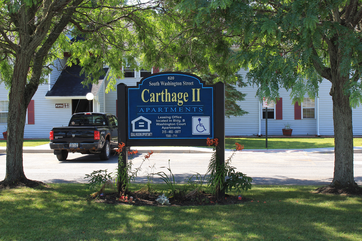 property management company syracuse ny image of the welcome sign to carthage II apartments