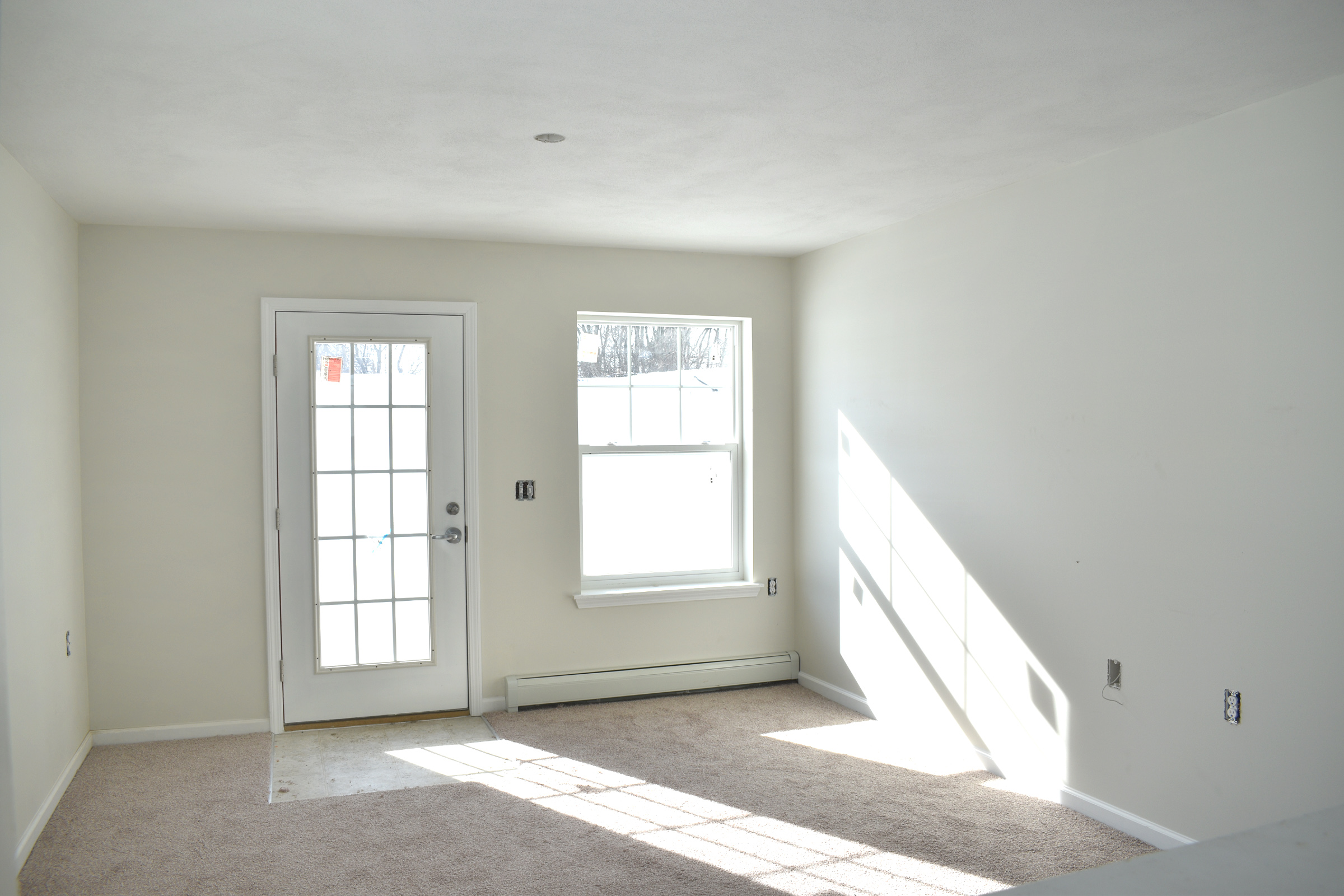 property management company client list syracuse ny living room during construction image of selkirk townhome