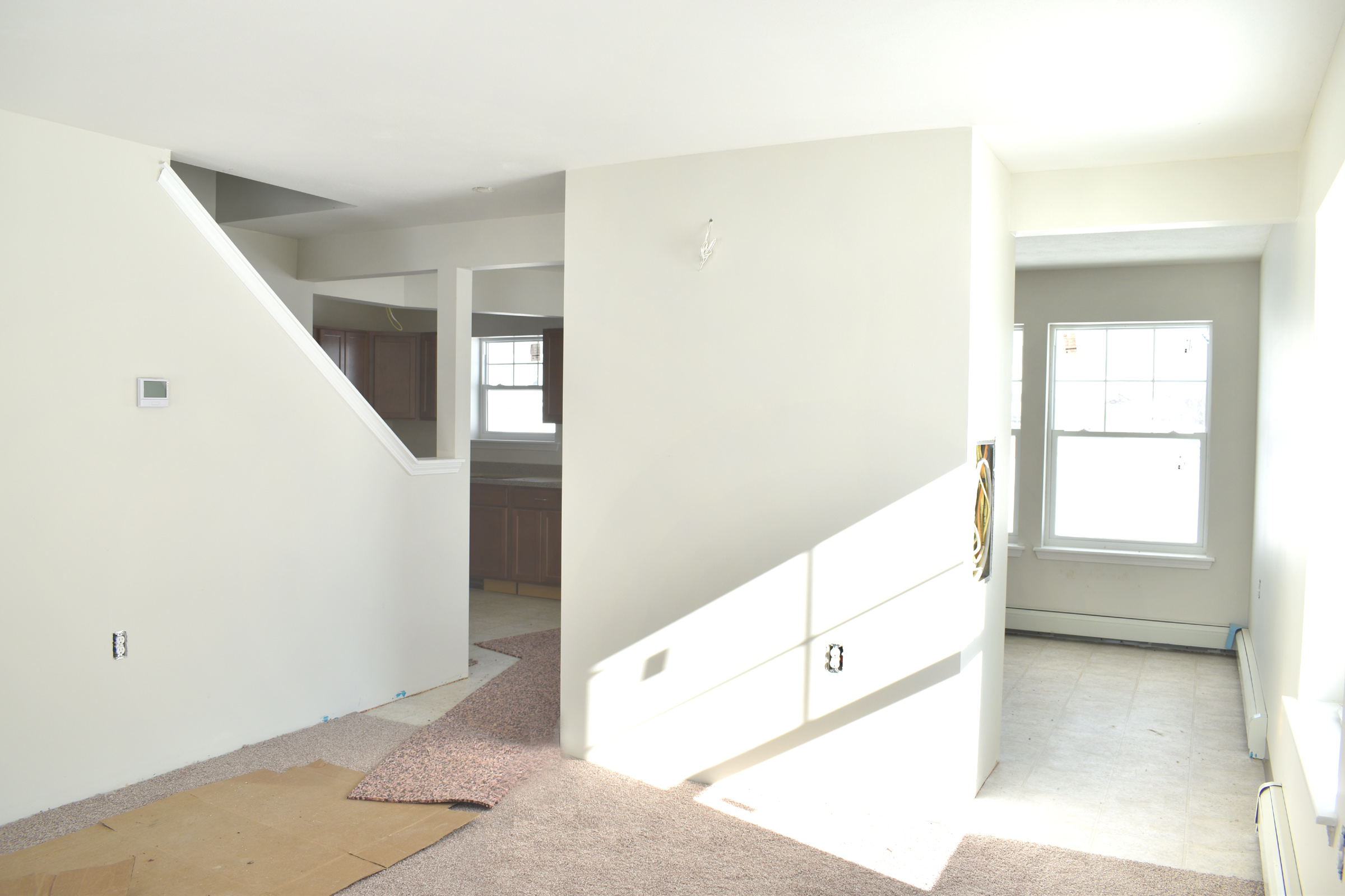 property management company client list syracuse ny living room and entry during construction image of selkirk townhome