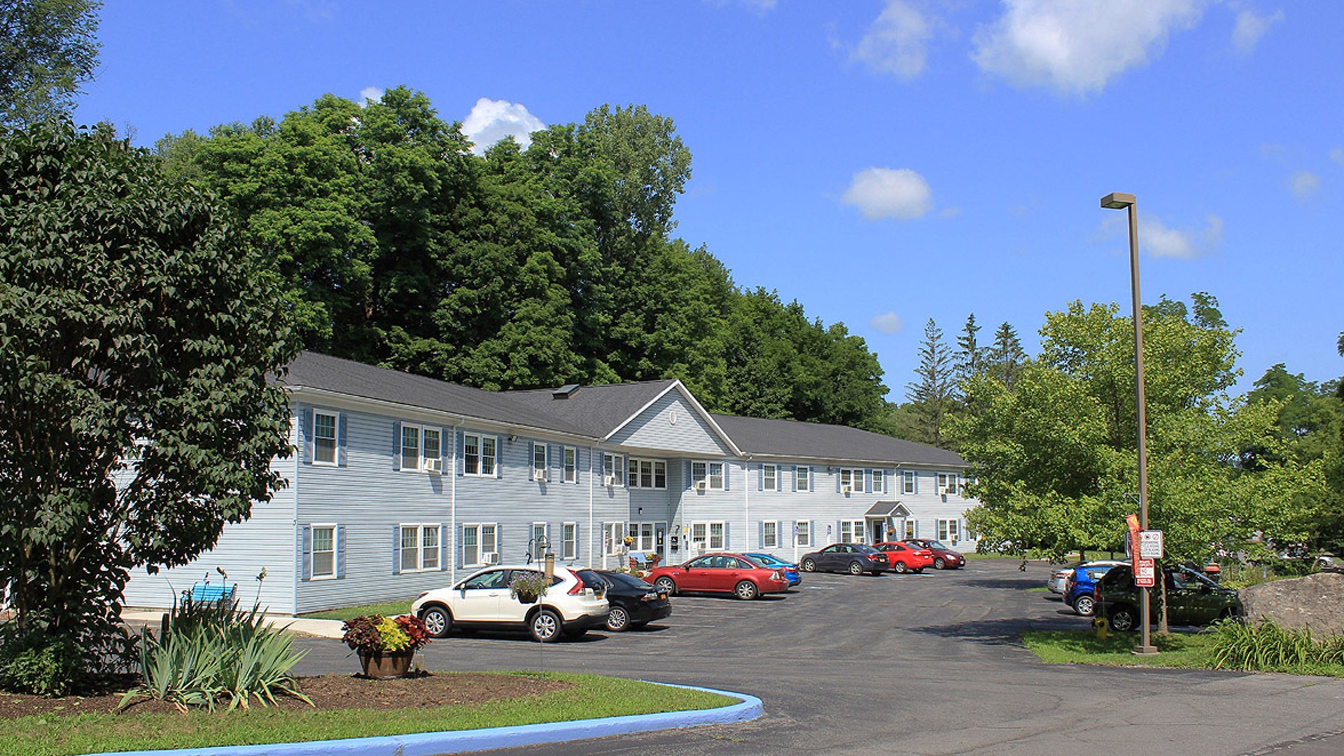 Senior Apartments near Marcellus NY exterior view of nine mile landing apartments from two plus four management