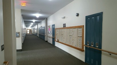 Senior Apartments near Watkins Glen NY thumbnail image of watkins glen school apartments historic hallway from two plus four management