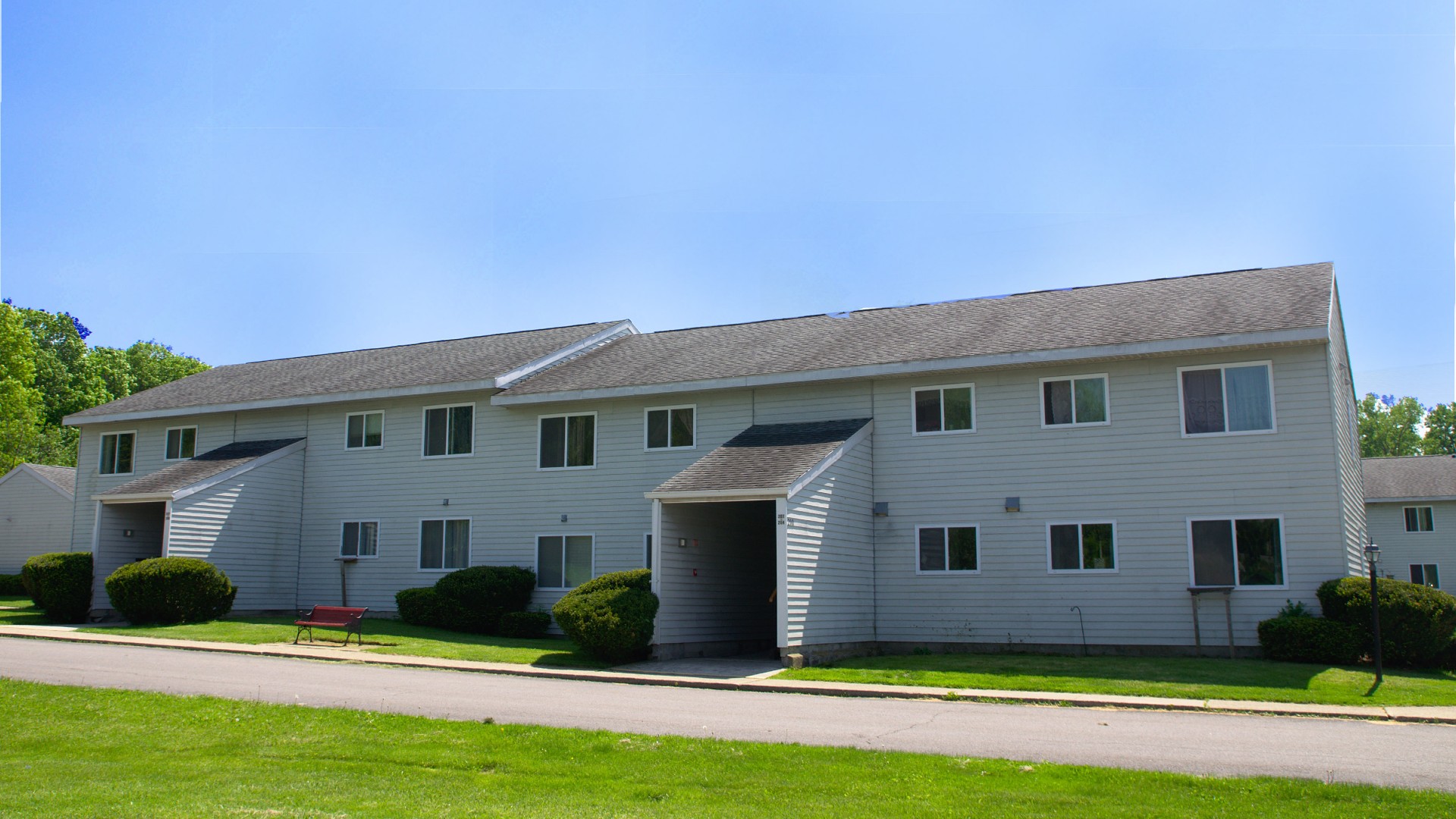 Senior Apartments near Avon NY exterior view of community manor I from two plus four management