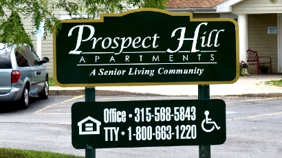 apartments near seneca falls ny thumbnail image of prospect hill senior apartments sign that reads a senior living community call us at 315-568-5843 and 1-800-663-1220 from two plus four management