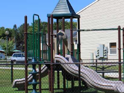 apartments near carthage ny thumbnail image of Washington court apartments playground from two plus four management