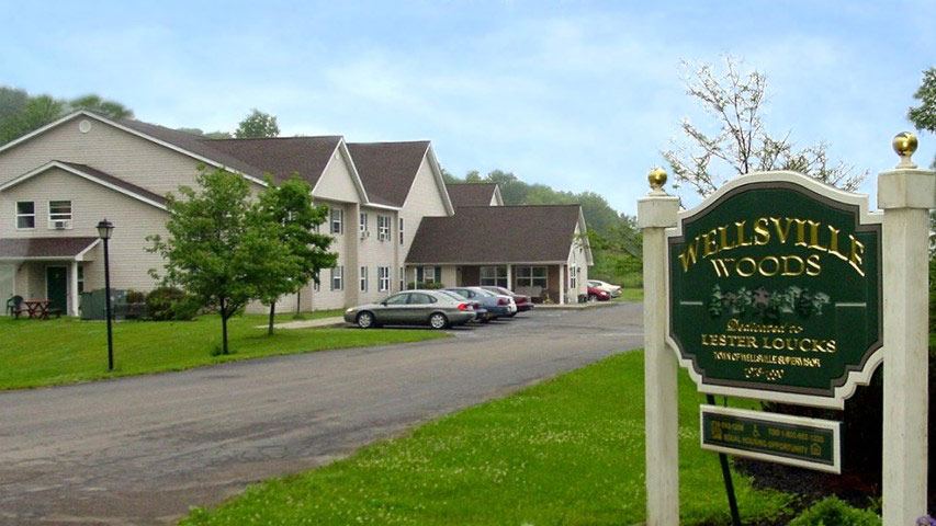 Senior Apartments near Wellsville NY exterior image of Wellsville Woods Senior Apartments from two plus four management