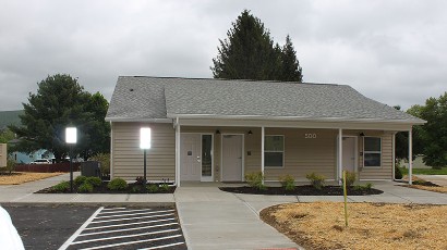 Apartments near Wellsville NY thumbnail image of highland pointe family apartments street view from two plus four management