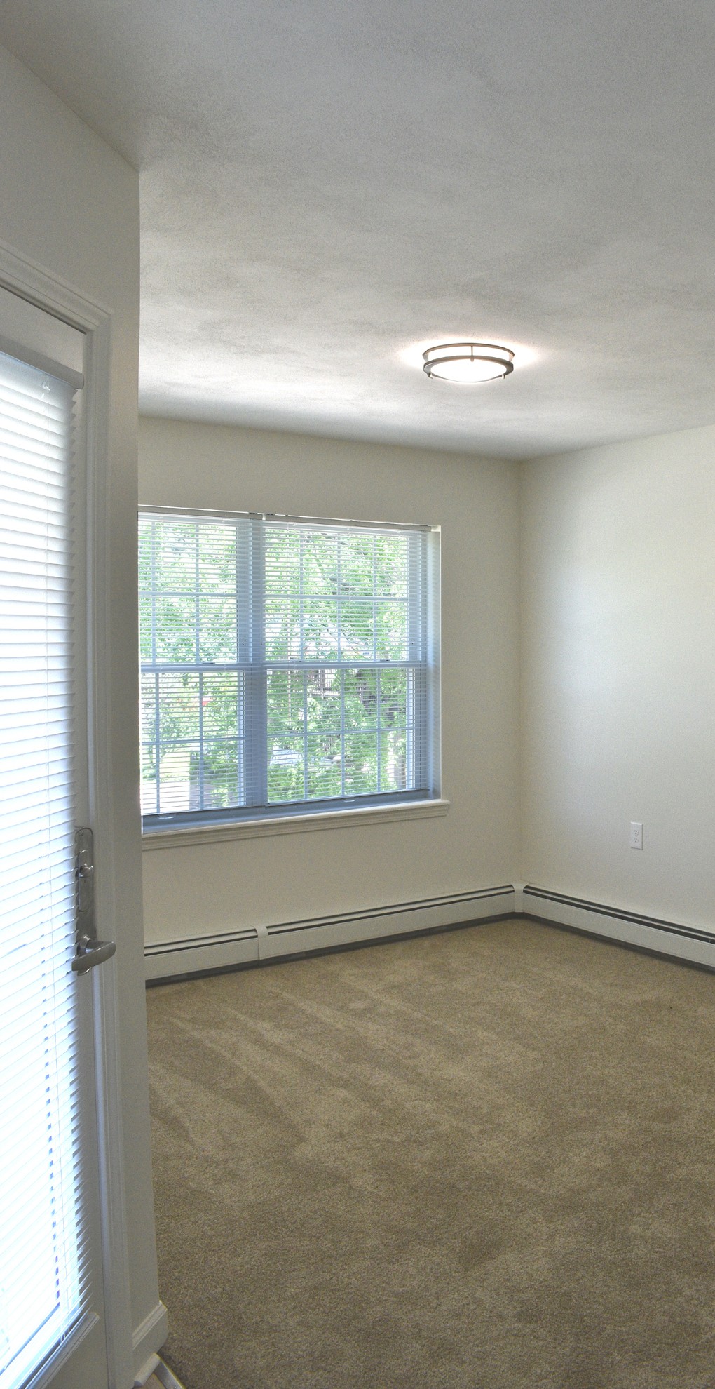 Townhomes near Johnson City NY image of fairmont park family townhomes living room from two plus four management