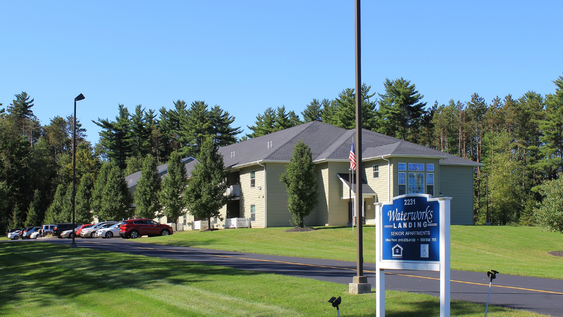 Senior Apartments near Central Square NY image of waterworks landing welcome sign from two plus four management