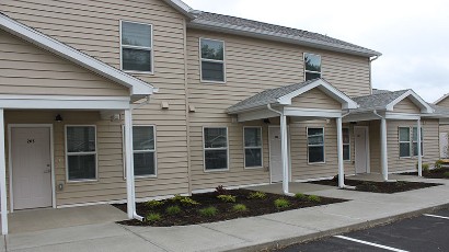 Apartments near Wellsville NY thumbnail image of highland pointe family apartments back view from two plus four management