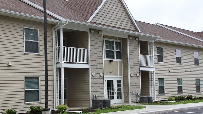 apartments near norwich ny thumbnail image of the side view for Cobblers Square family apartments from two plus four management