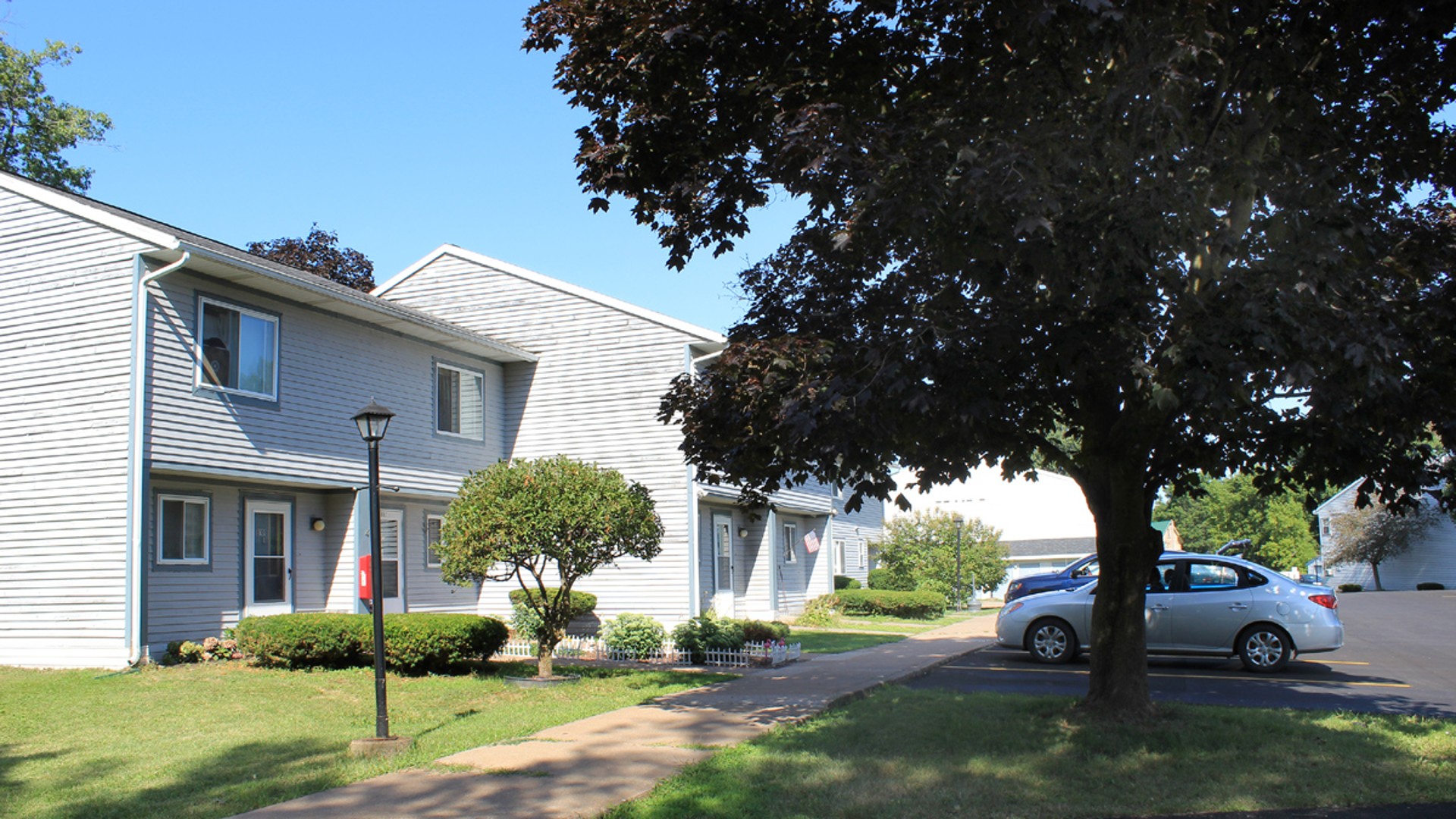 Apartments near Lowville NY image of lewis and lowville heights family apartments back view from two plus four management