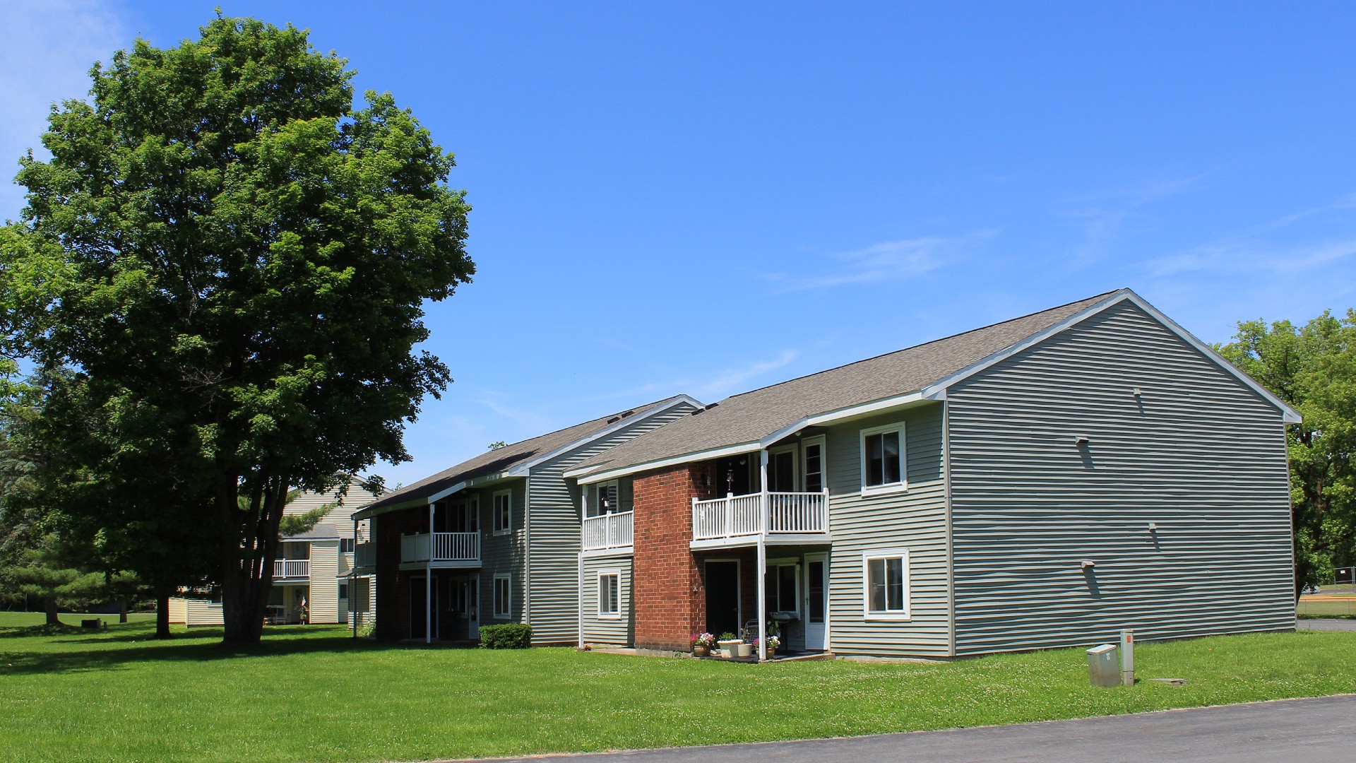 apartments near weedsport ny image of side view for village manor I apartments from two plus four construction