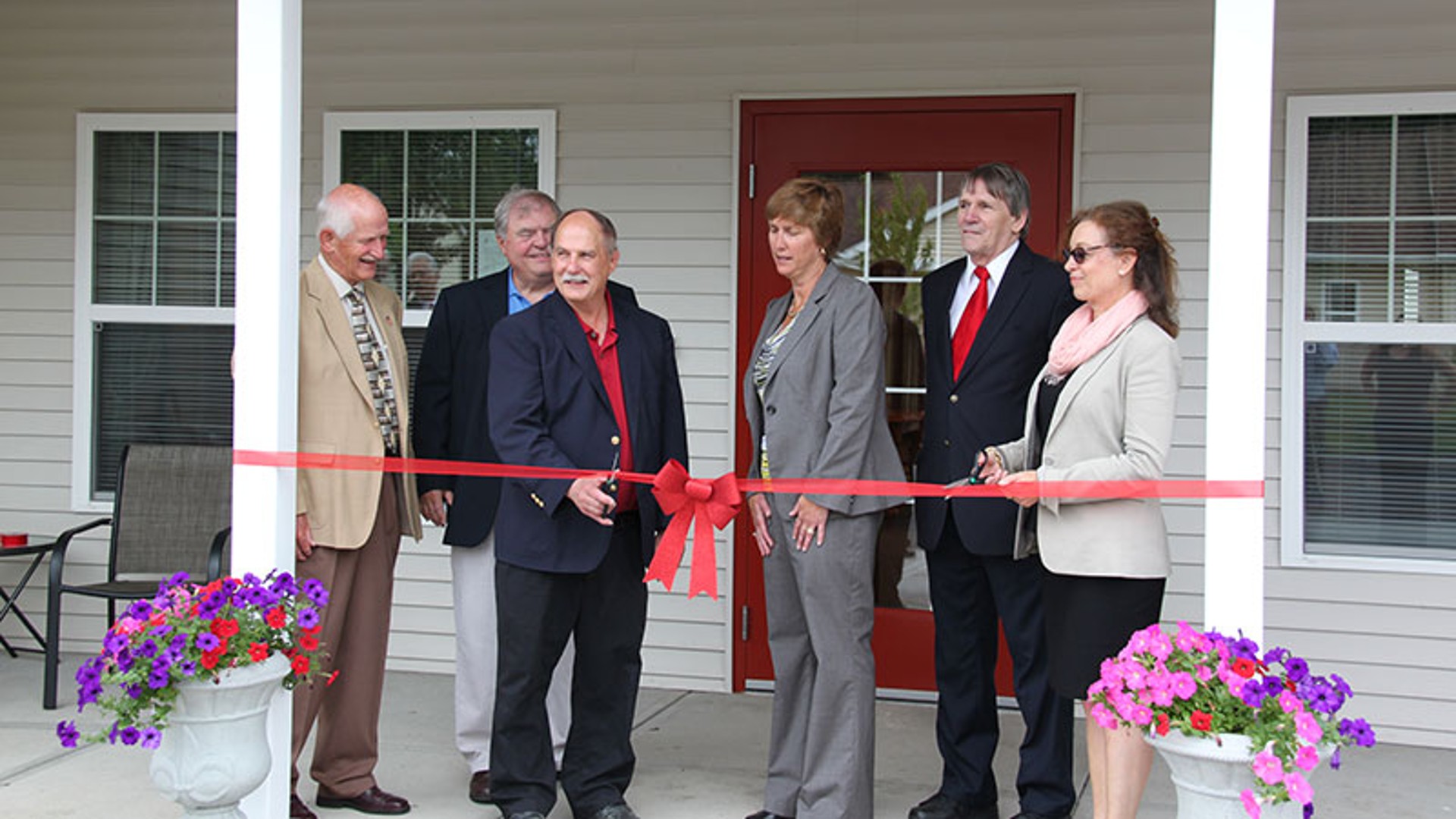 apartments near sidney ny image of ribbon cutting ceremony for sherwood landing family apartments from two plus four management