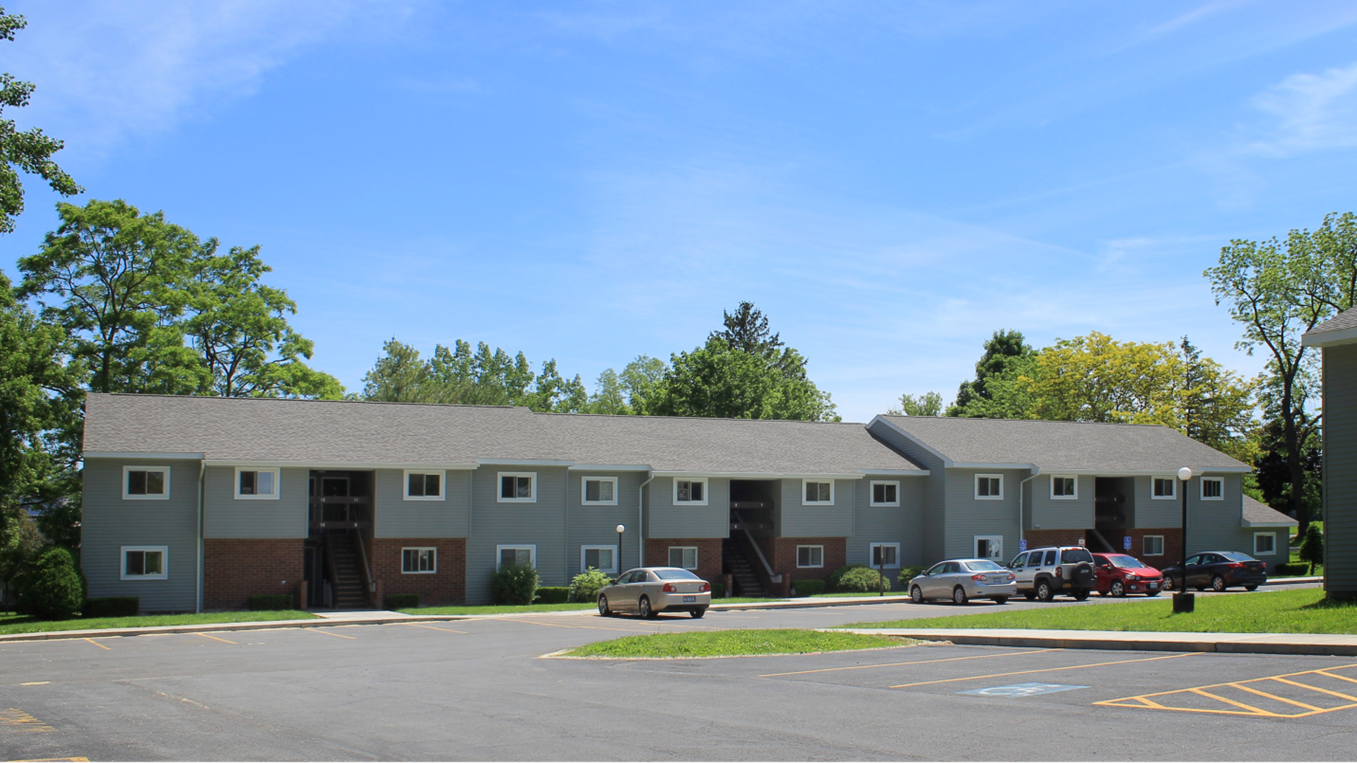 apartments near weedsport ny exterior view of village manor I and II housing from two plus four management