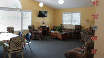 Senior Housing near Marcellus NY thumbnail image of upper crown landing community room from two plus four management