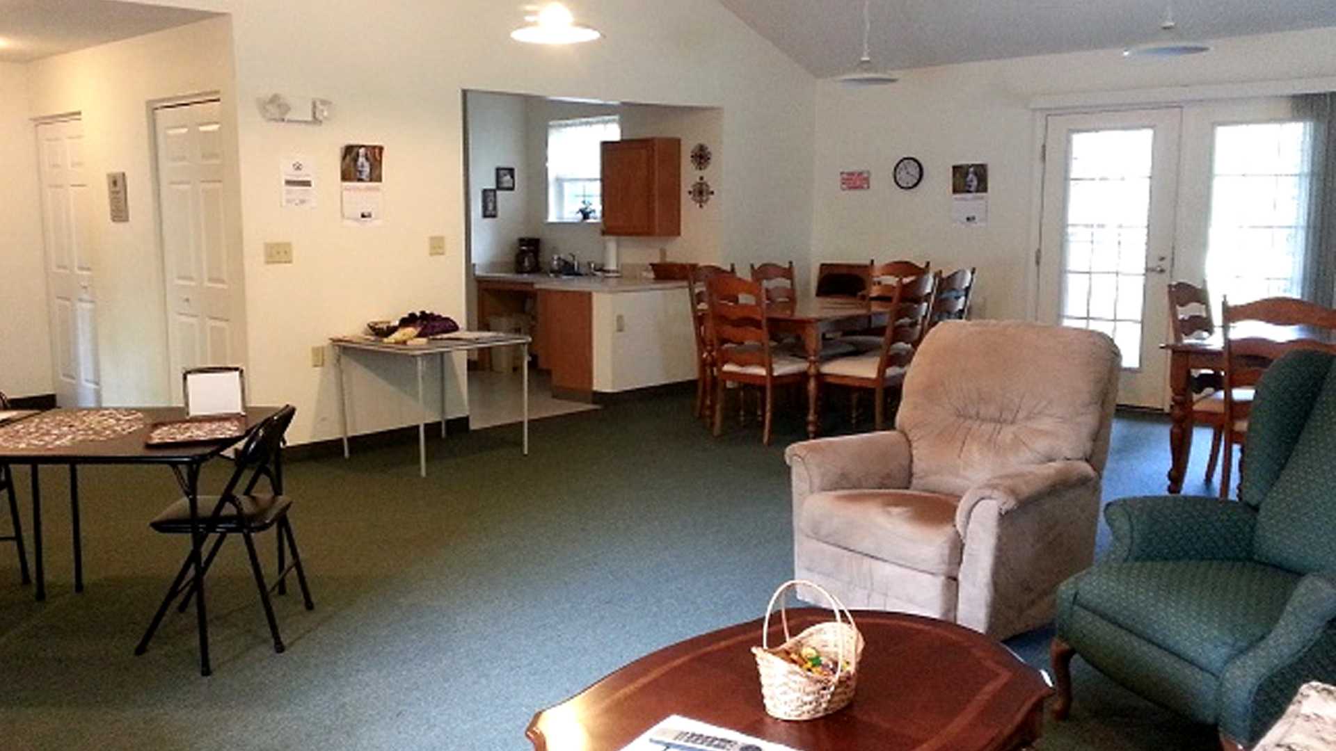 Senior Apartments near Homer NY image of ellis pines apartments community room from two plus four property management