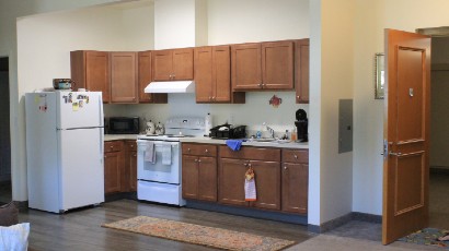 Rent Apartments near Auburn NY thumbnail image of west middle school family apartment kitchen from two plus four management