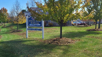 Apartments near Wellsville NY thumbnail image of highland pointe family apartments welcome sign from two plus four management