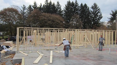 apartments near norwich ny thumbnail image of the construction for Cobblers Square family apartments from two plus four management