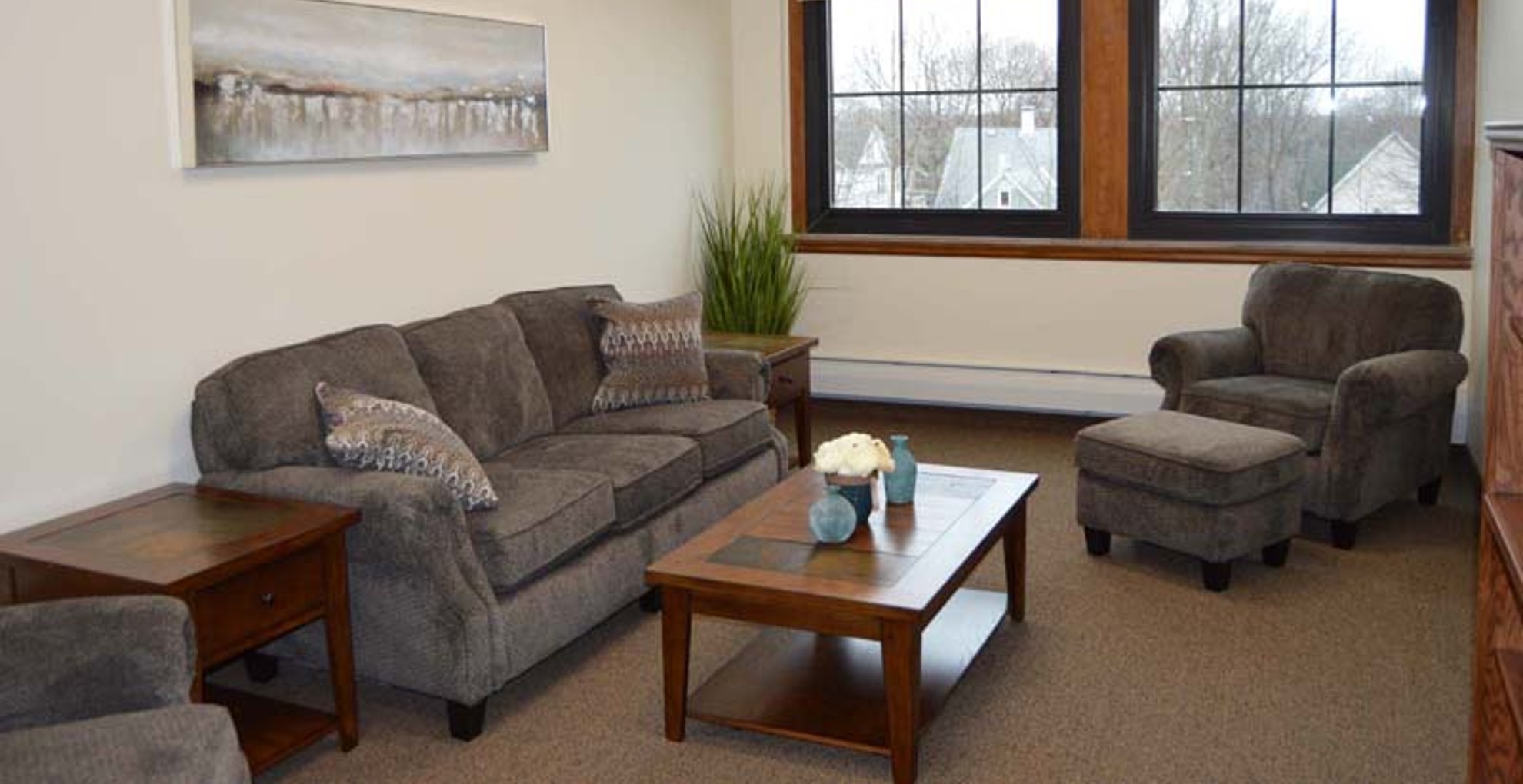 Rent Apartments near Auburn NY image of west middle school family apartment living room from two plus four management