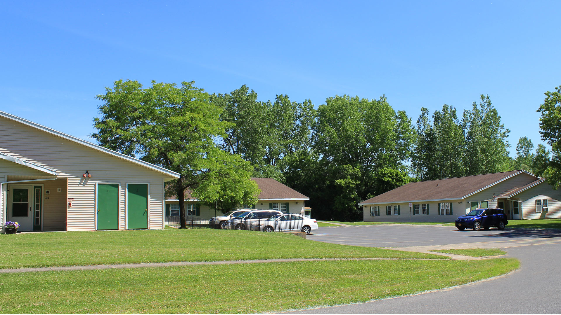 Apartments for rent near auburn ny exterior street view image of elaine estates managed by two plus four management