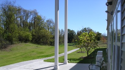 Senior Apartments near Oneida NY thumbnail image of seneca fields senior apartments patio from two plus four management