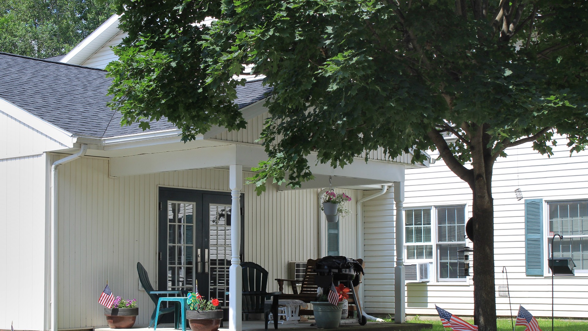 Senior Housing near Marcellus NY image of upper crown landing patio from two plus four management