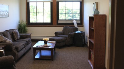 Rent Apartments near Auburn NY thumbnail image of west middle school family apartment reading room from two plus four management