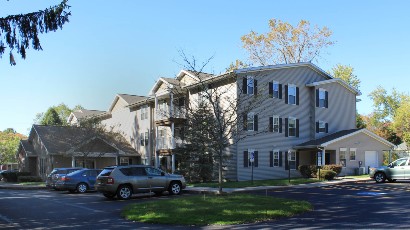 Senior Apartments near Homer NY thumbnail image of ellis pines apartments exterior view from two plus four property management