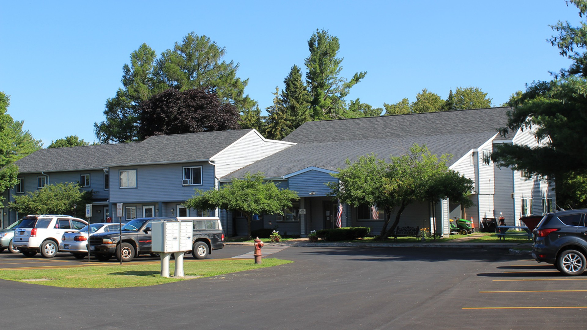 Apartments near Lowville NY exterior view of lewis and lowville heights family apartments from two plus four management