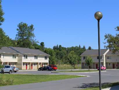 apartments near carthage ny thumbnail image of Washington court apartments exterior from two plus four management