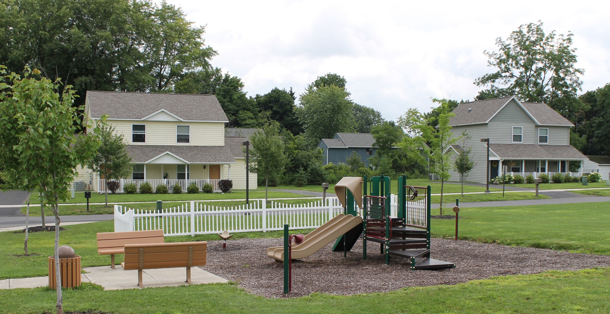 townhomes near auburn ny image of Greenview Hills family apartments playground from two plus four management