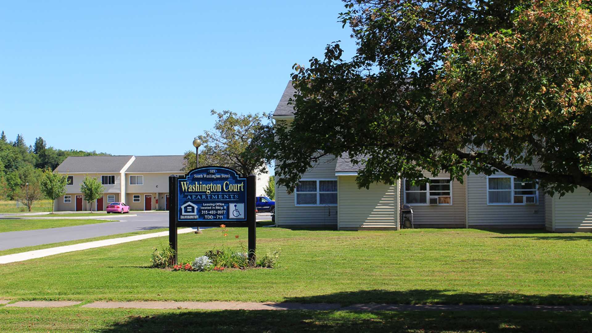 apartments near carthage ny welcome sign for Washington court apartments from two plus four management