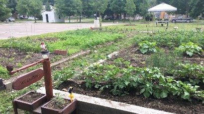 Senior Apartments near Watkins Glen NY thumbnail image of watkins glen school apartments community room garden from two plus four management