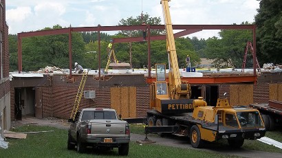 Senior Apartments near East Syracuse NY thumbnail image of heman street school apartments construction from two plus four management