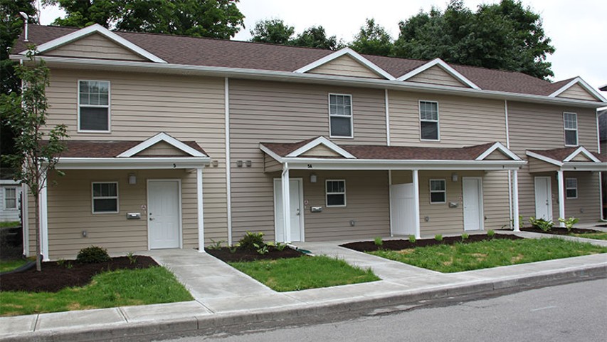 apartments near norwich ny exterior image of Cobblers Square family apartments from two plus four management