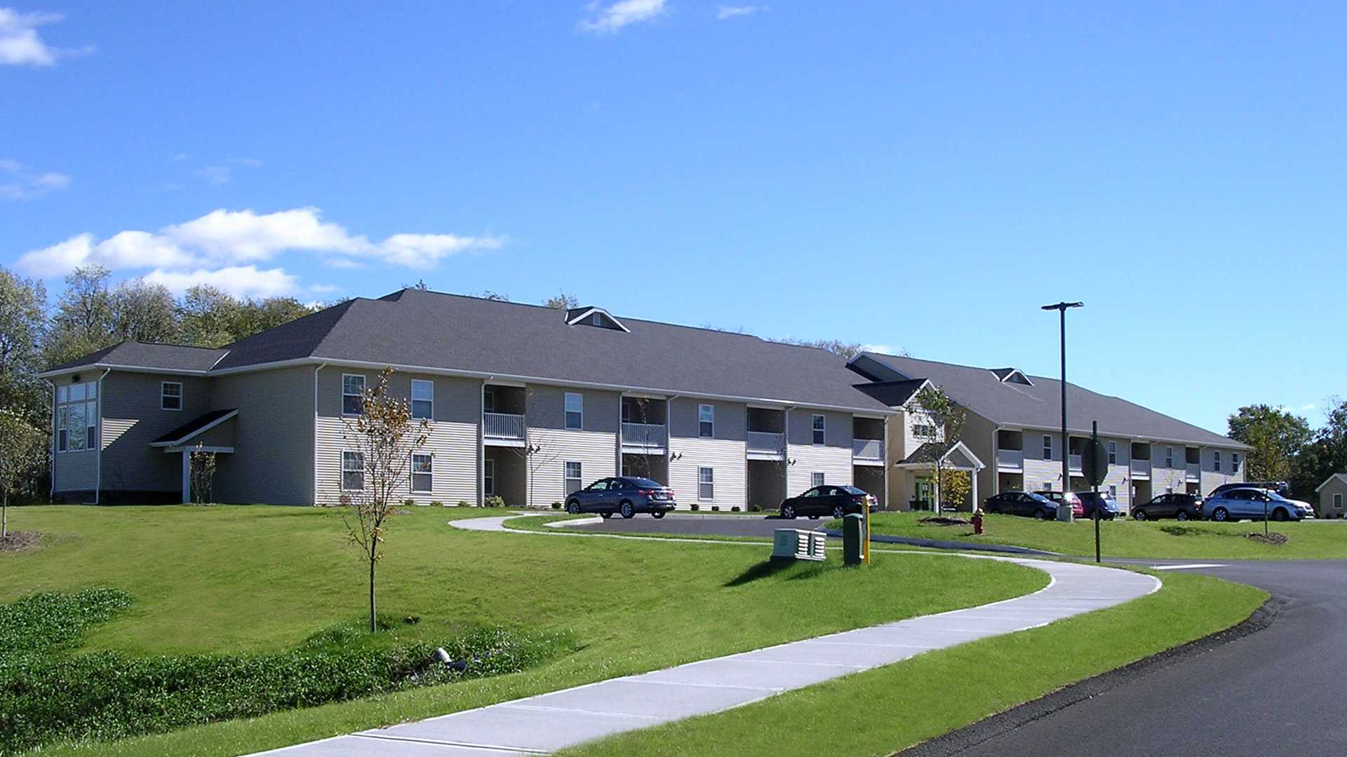 Senior Apartments near Oneida NY exterior view of seneca fields senior apartments from two plus four management