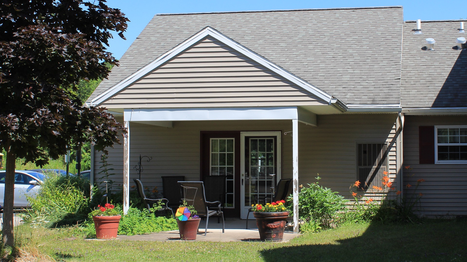 Senior Housing near Camillus NY image of connelly acres apartments patio from two plus four property management