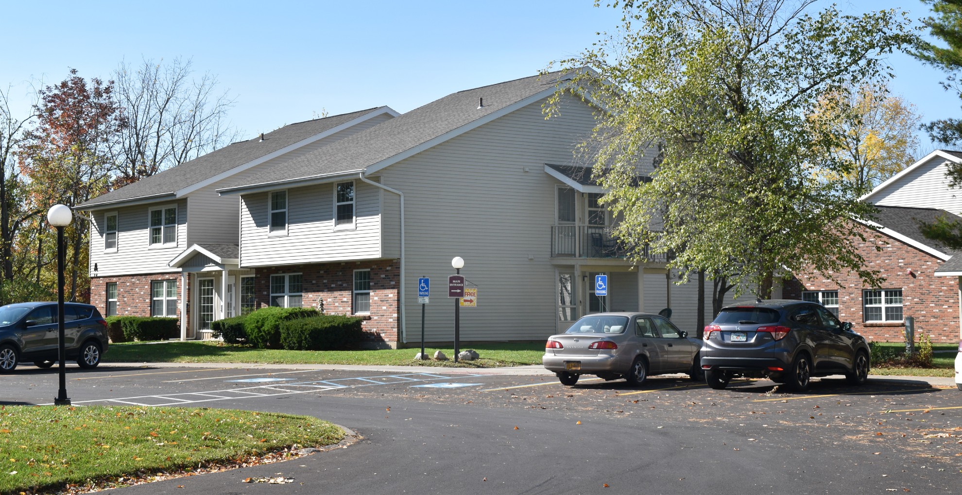 Senior Apartments near Union Springs NY image of union springs fox senior apartment building with parking from two plus four management