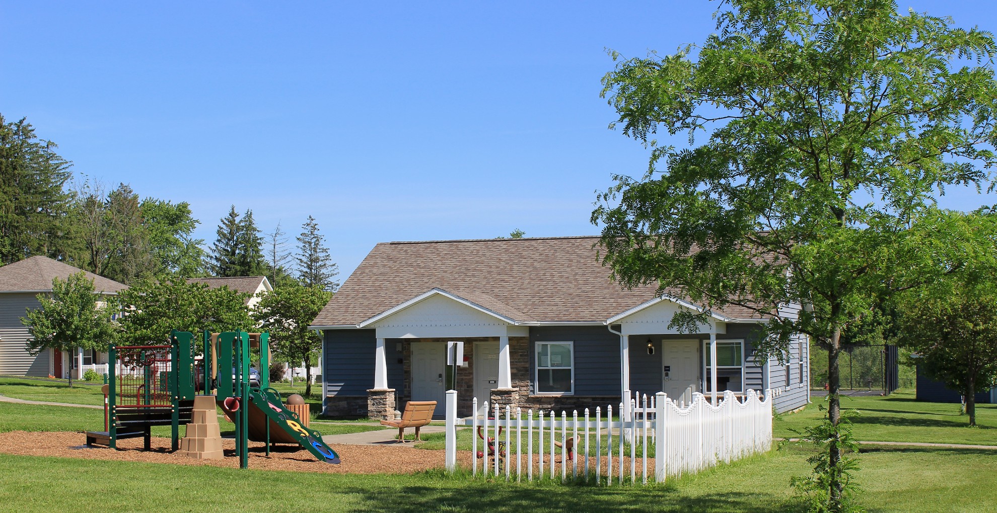 townhomes near auburn ny image of Greenview Hills family apartments community office and playground from two plus four management