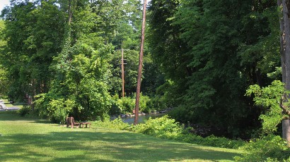 Senior Apartments near Marcellus NY thumbnail image of the backyard view of nine mile landing apartments from two plus four management