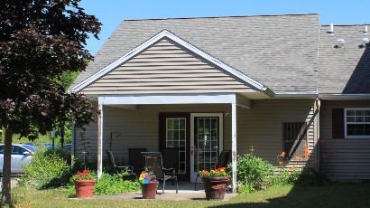 Senior Housing near Camillus NY thumbnail image of connelly acres apartments patio from two plus four property management