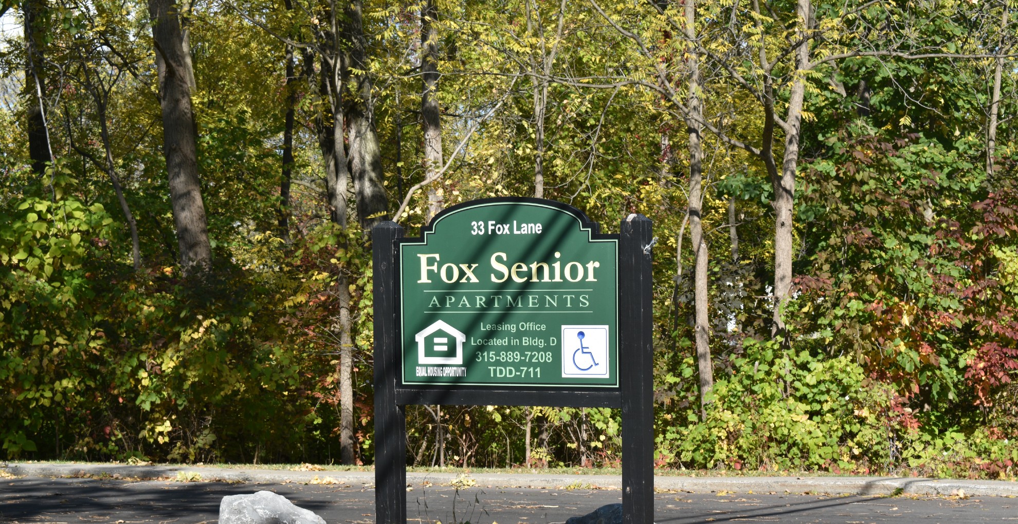 Senior Apartments near Union Springs NY image of union springs fox senior apartments sign 33 fox lane 315-889-7208 TDD-711 leasing office D from two plus four management