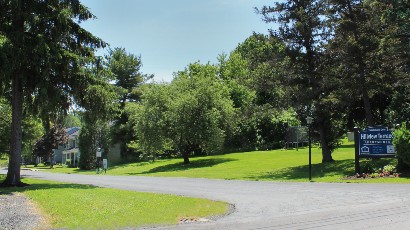 senior apartments near cato ny thumbnail image of hillview terrace apartments and welcome sign from two plus four management