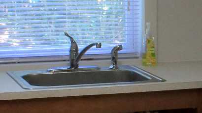 sink view of the community laundry room near camillus ny