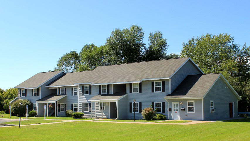 Apartments near Sackets Harbor NY hero exterior image of shipyard family apartments for two plus four management